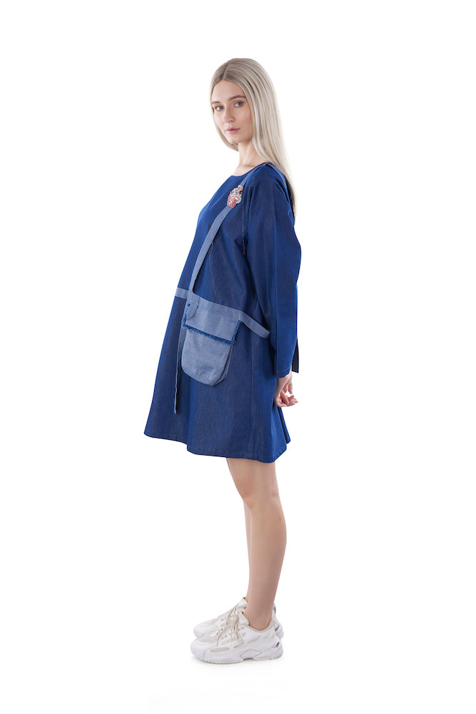 Dress with stylized pockets