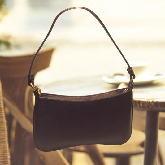 Sling bag with medium length strap