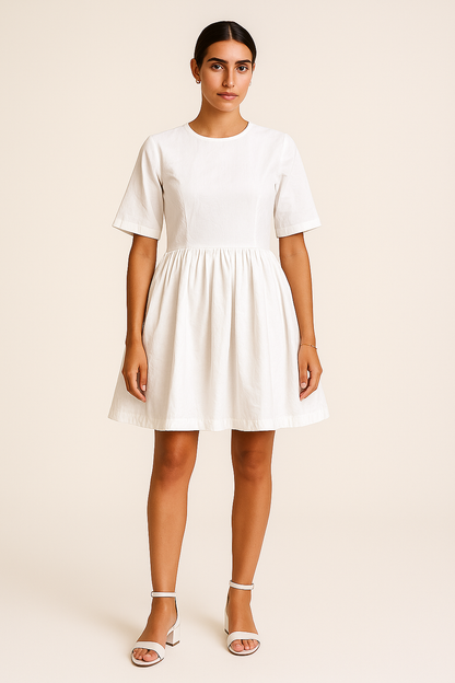 White Back tab Dress - Minimalist elegance with a playful twist